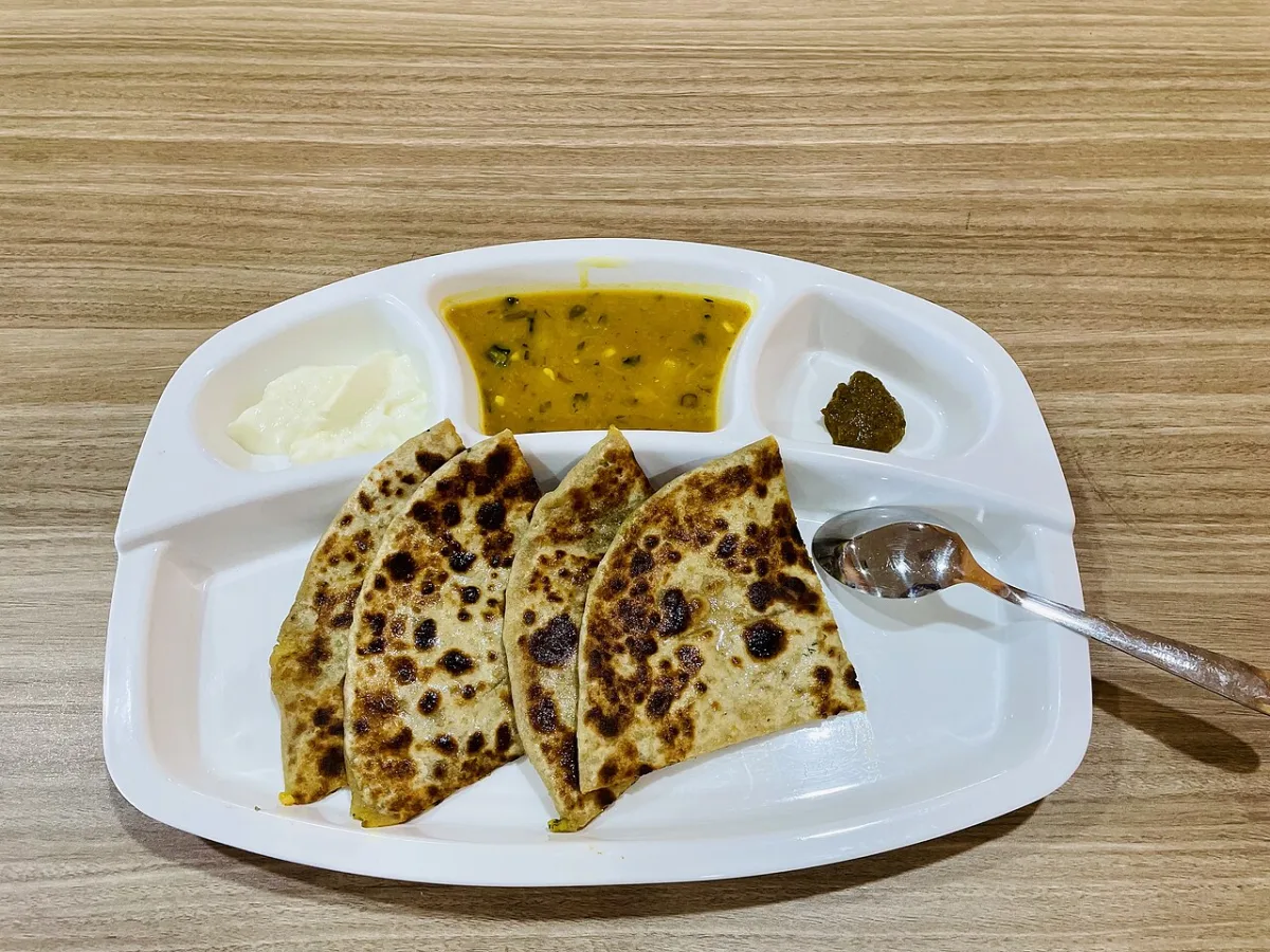 With dal, dahi and achaar on the side