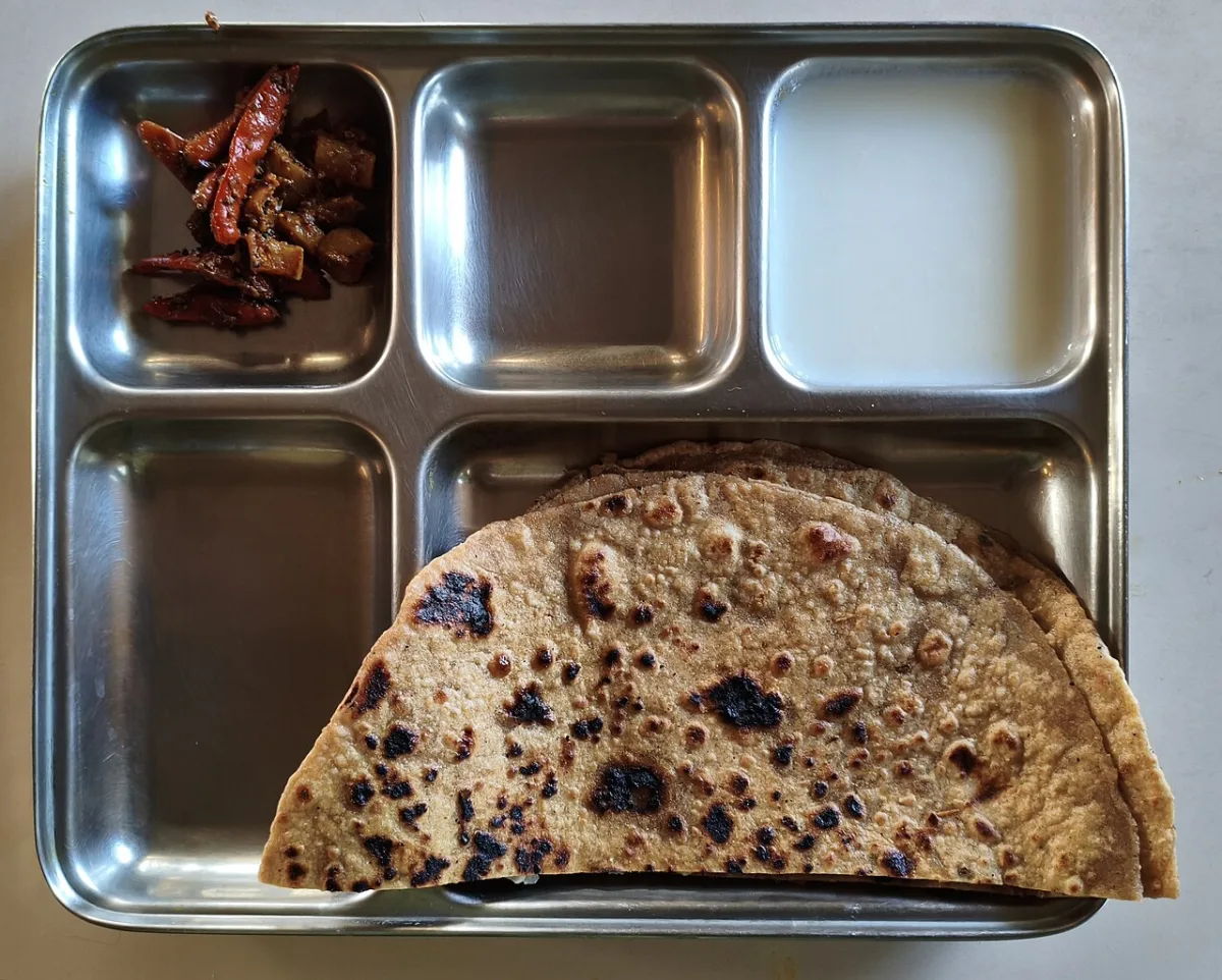 Mooli paratha on a steel thali